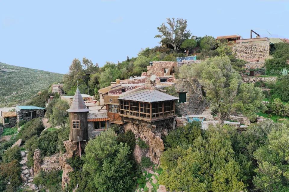 Eco House Patmos among trees on the hillside