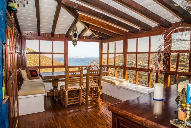 Eco House Patmos – window dining room overlooking the sea