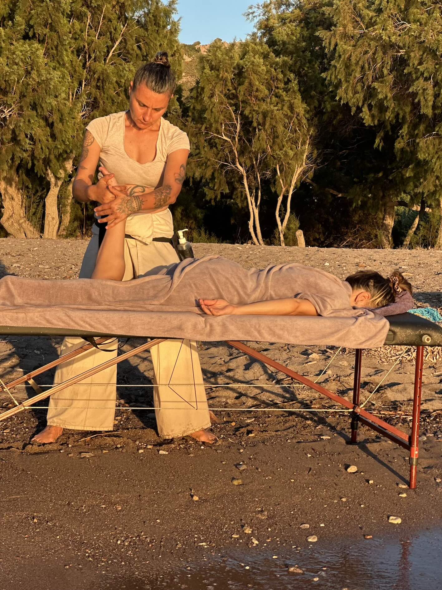 Ivelina giving a massage outdoors