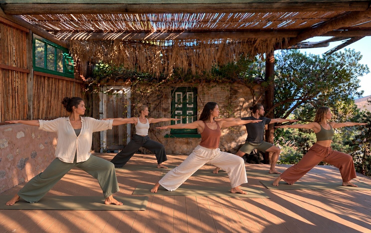 Yoga and movement retreat on the covered wooden terrace at Eco House Patmos